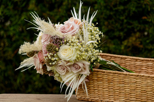White and pink flowers in a basket