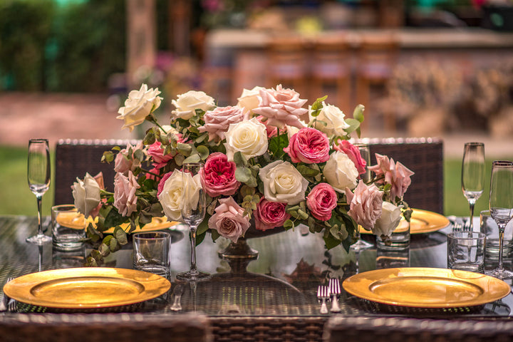 Pink and white Ecuadorian garden roses Easter table arrangement